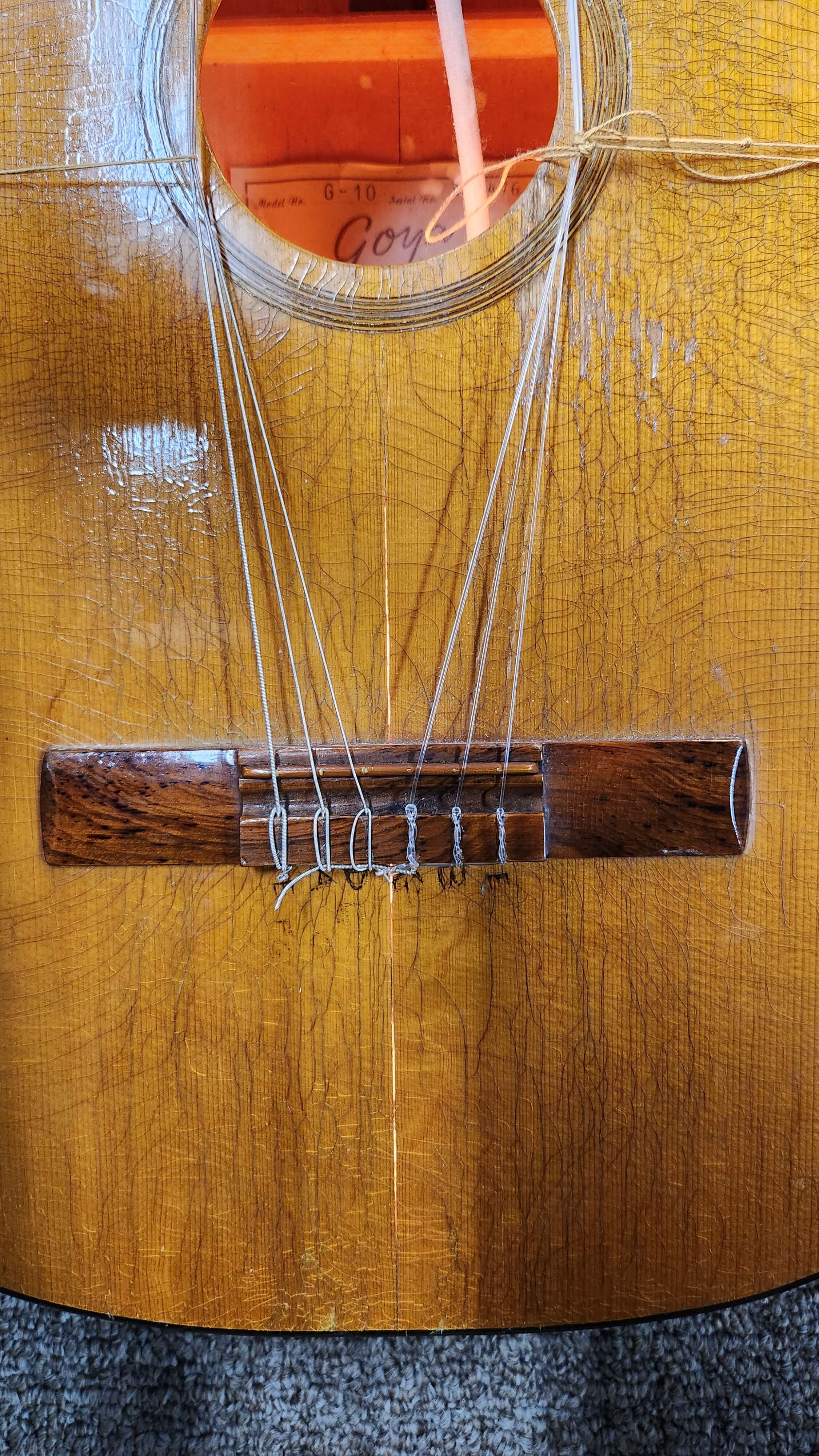 Back crack on an old Goya classical guitar - Crack Repairs - Guelph Guitar Repair