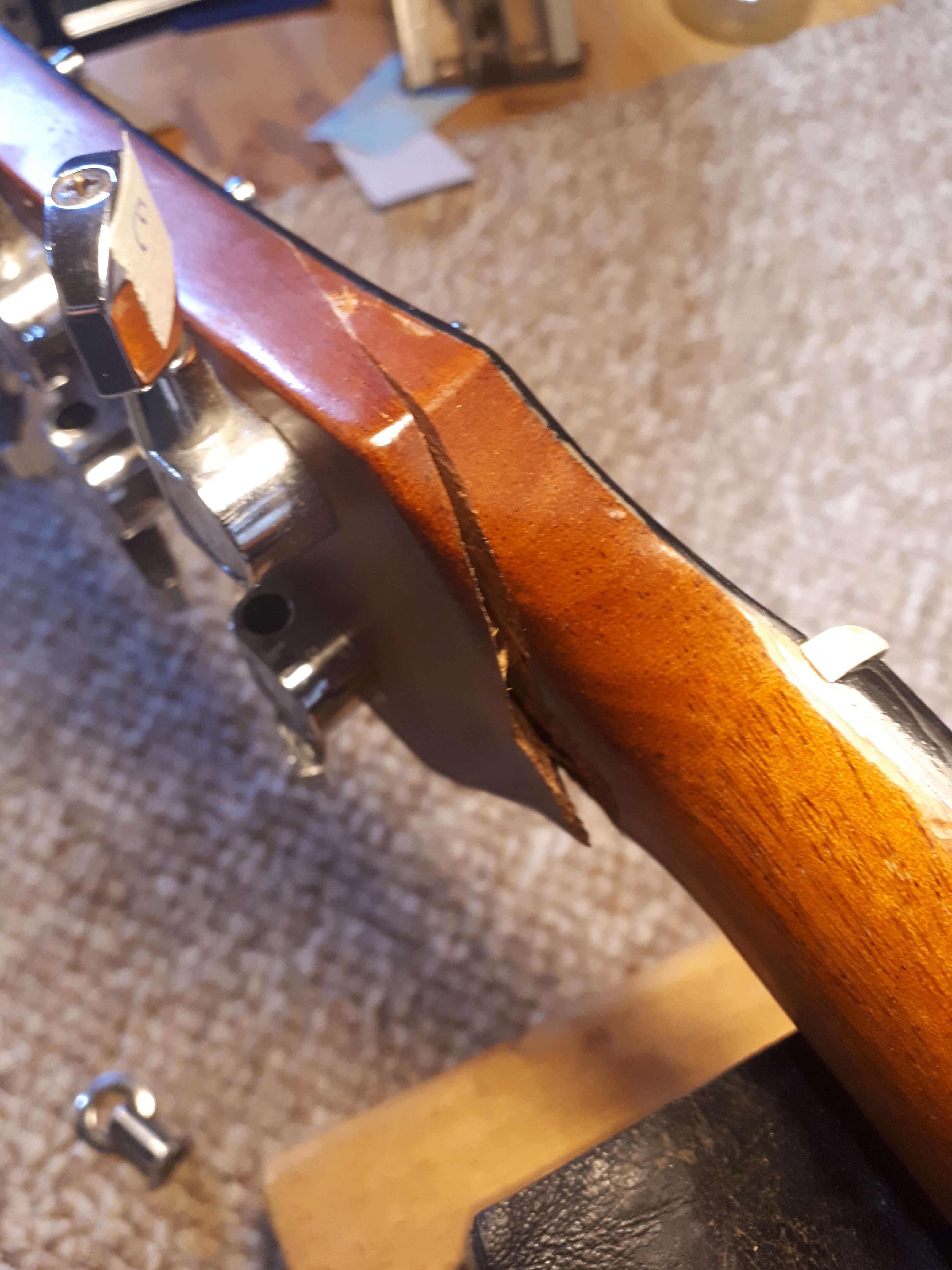Broken headstock that needs to be repaired - Headstock repairs - Guelph Guitar Repair