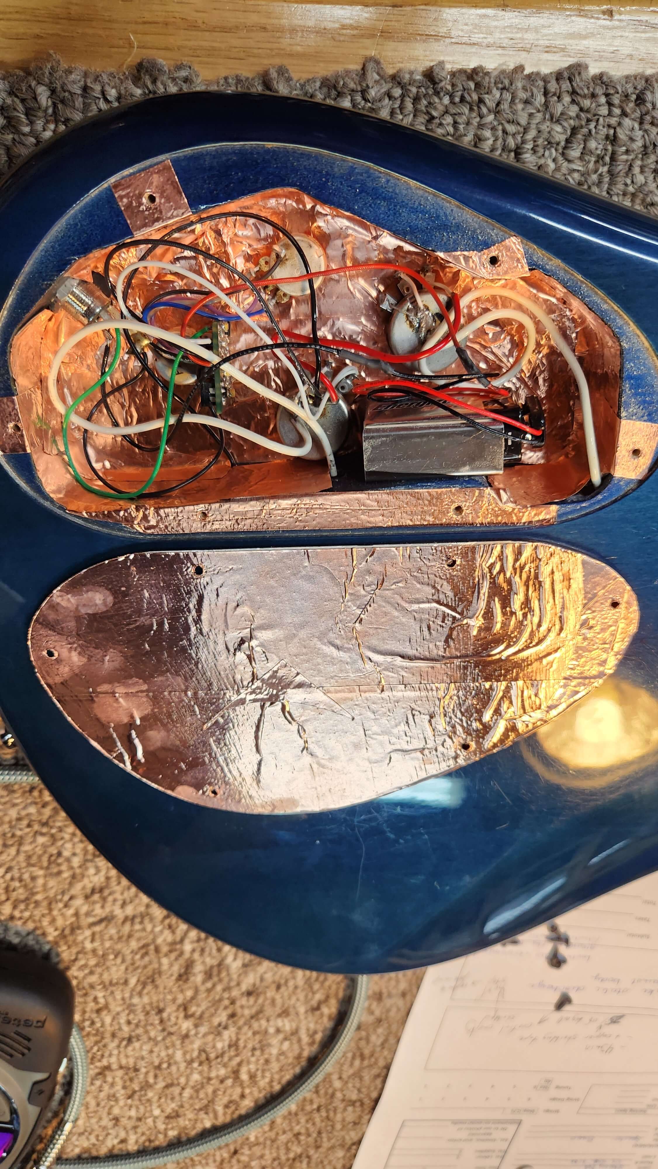 Spaghetti plate of wires in an electric bass guitar - Guitar Electronics - Guelph Guitar Repair